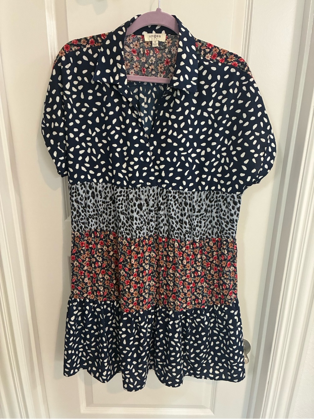 Umgee Navy Mixed-Print Short Sleeve Tiered Tunic with Red Floral Accent